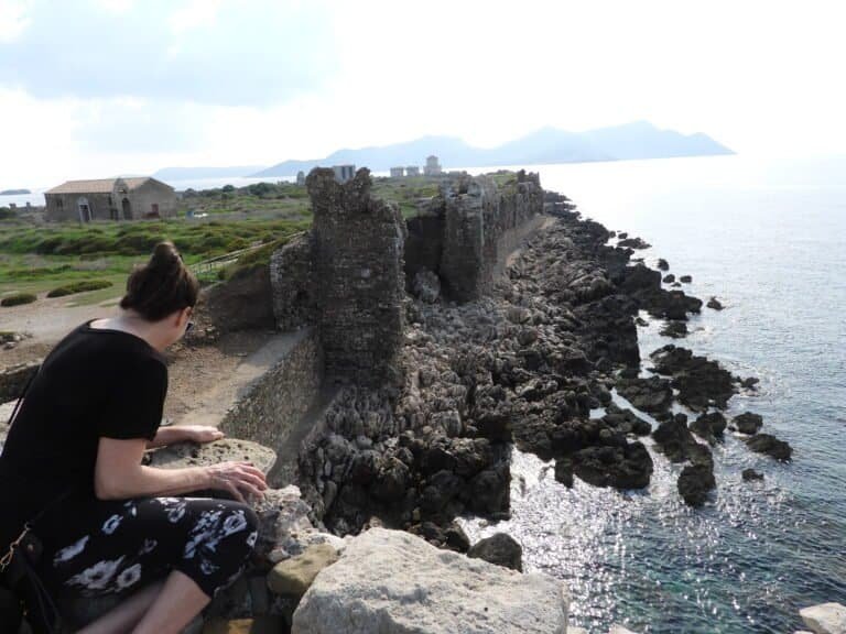 Historic coastal ruins with ocean view at Odyssey Academy.