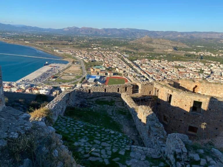 Scenic view of Odyssey Academy overlooking the sea and cityscape.