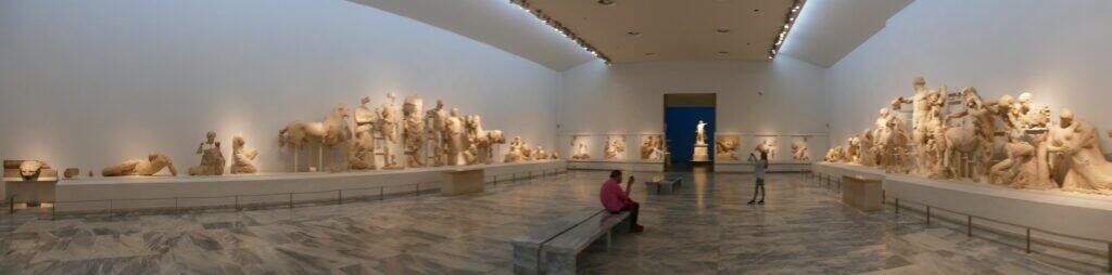 Modern art exhibition at Odyssey Academy with sculptures and installations.