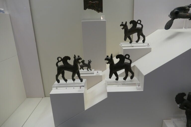 Bronze animal sculptures displayed at Odyssey Academy exhibition.